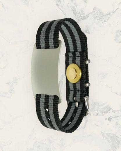 Natural Pain Relief and EMF Protection Bracelet Nylon Band Color Black and Gray Striped with a Silver Slider