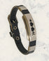 Frequency Jewelry Natural Pain Relief and EMF Protection Bracelet Leather Band Color Black with Two Hearts and an arrow design on a silver metal slider