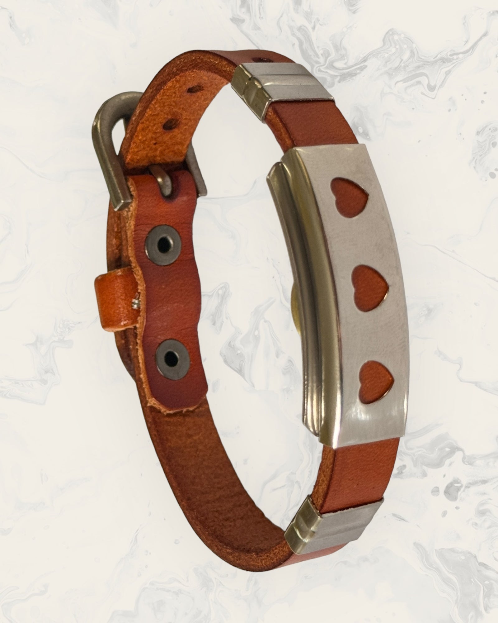 Frequency Jewelry Natural Pain Relief and EMF Protection Bracelet Leather Band Color Burnt Orange with Three Hearts design on a silver metal slider