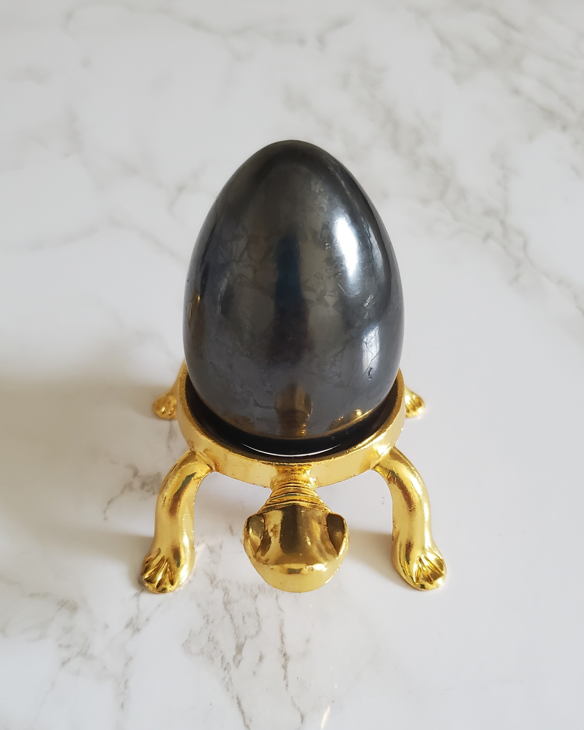 Natural Pain Relief and Protection from 5G and EMFs Shungite Egg with Large Gold Turtle Stand